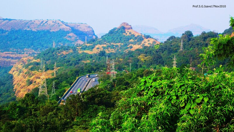 Highway Through Hilly Landscape