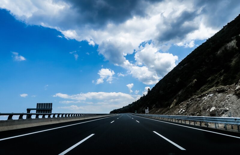 Highway Through Mountain Pass — Blue, Dramatic