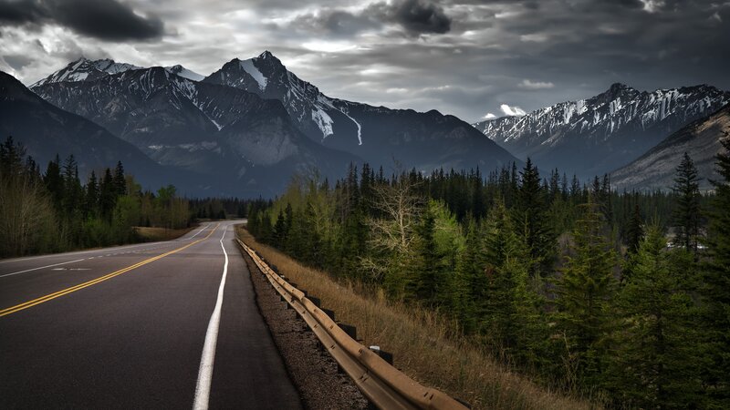 Highway Through Mountain Pass — Gray, Dramatic
