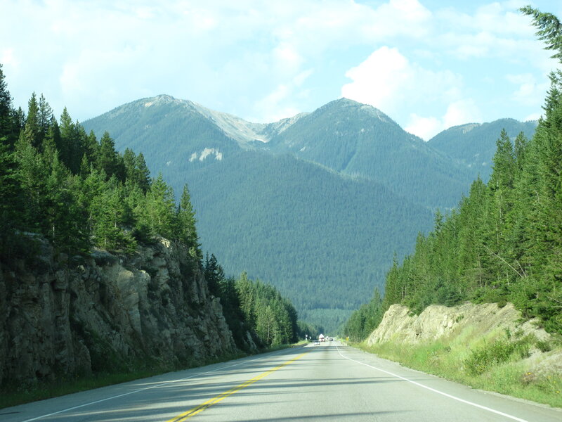 Highway Through Mountain Valley — Green, Serene