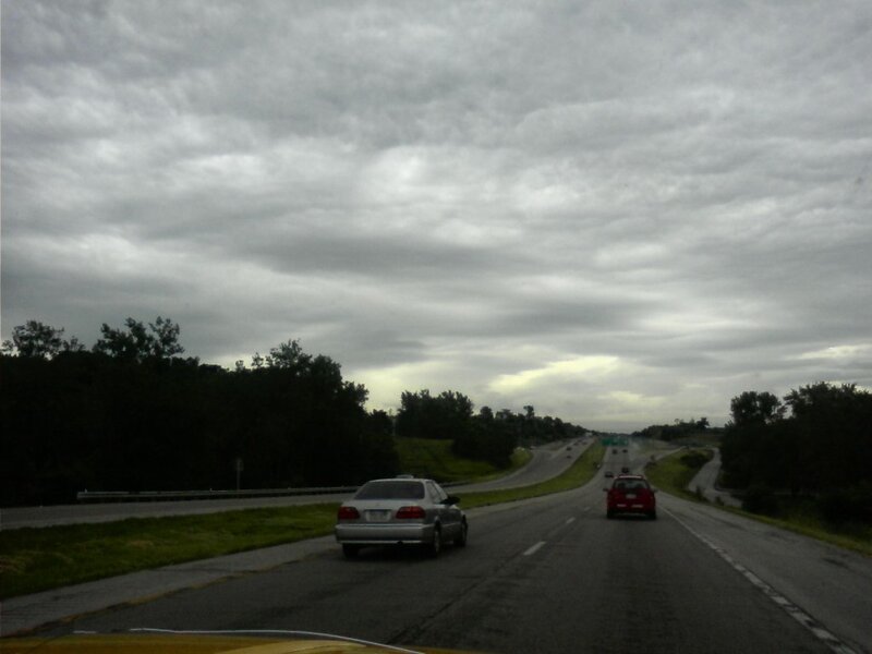 highway under cloudy sky