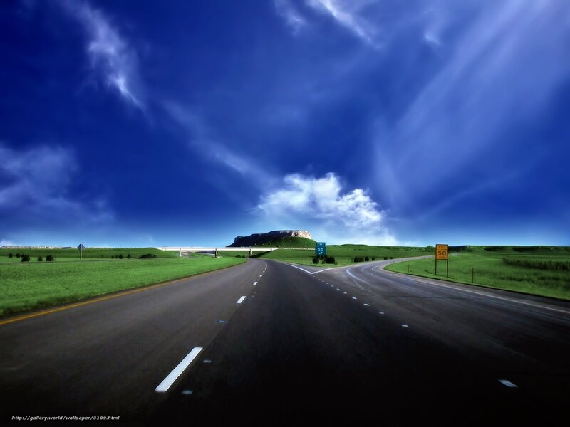 Highway under dramatic sky
