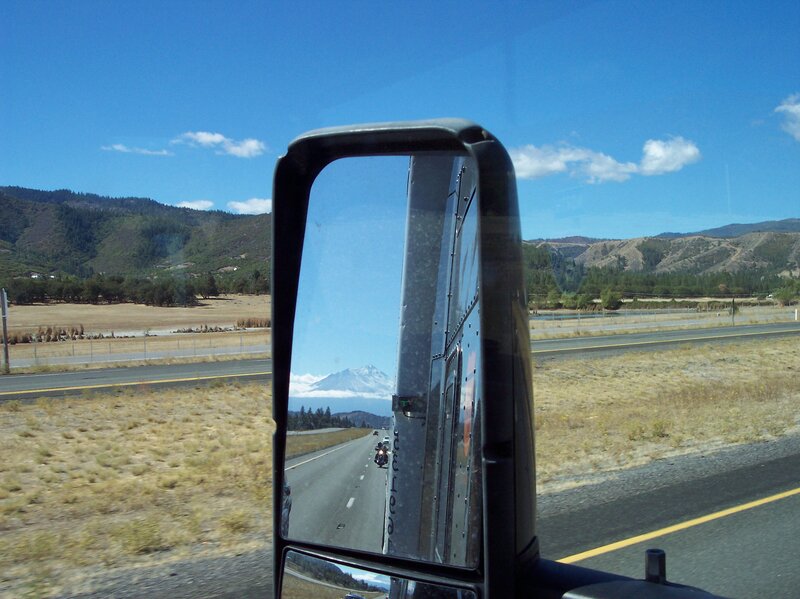 Highway view with mountain reflection