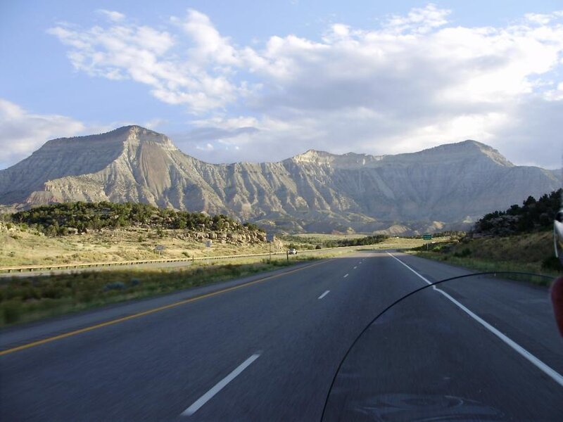 Highway with mountains in background