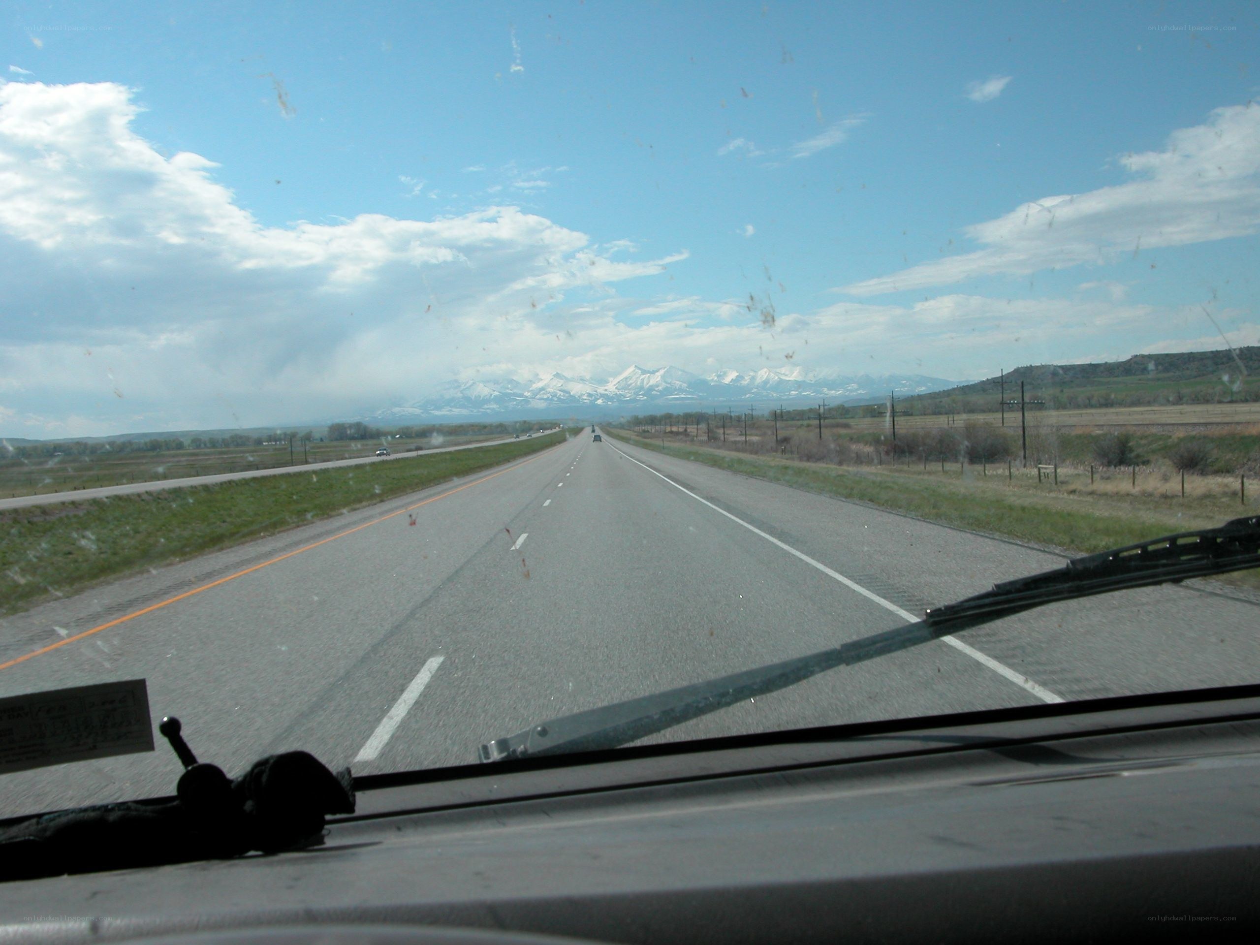 Highway with mountains in distance
