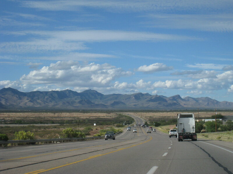 Highway with Trucks and Cars