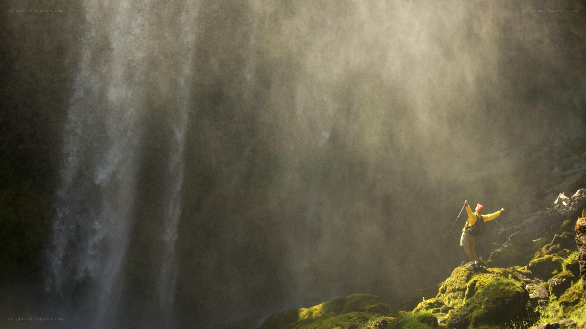 Hiker at a waterfall