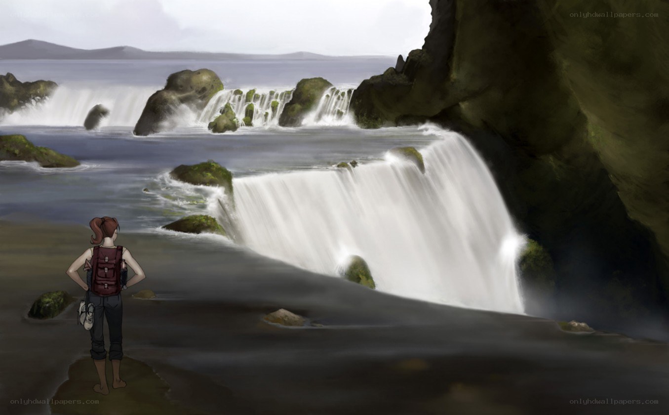 hiker at waterfall