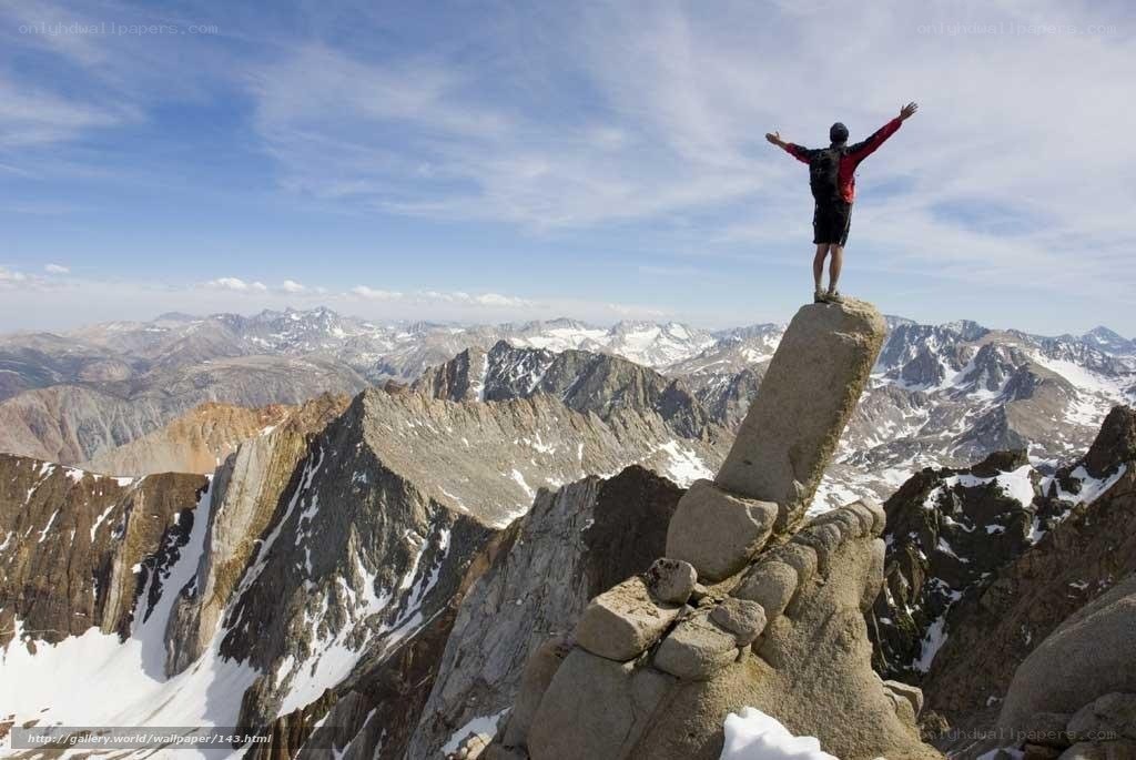 Hiker celebrates mountain summit