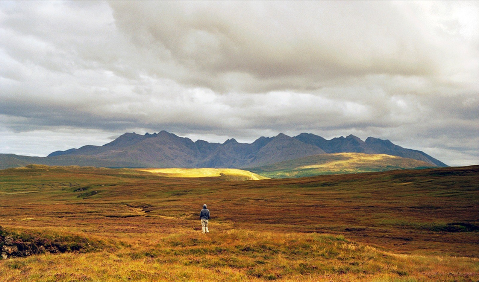 Hiker in a vast landscape
