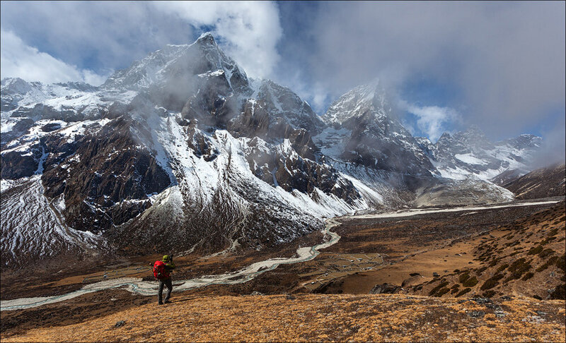 Hiker in Mountain Valley — Brown