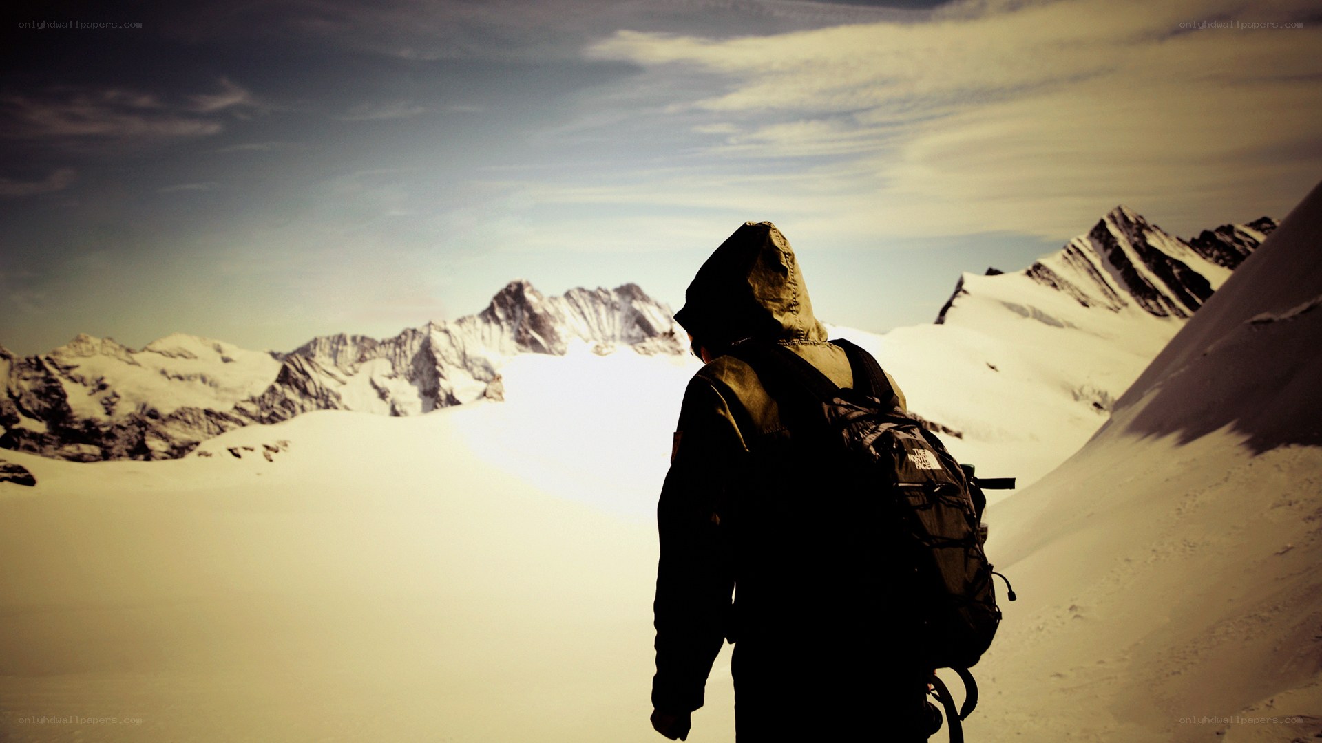 hiker in snowy mountains