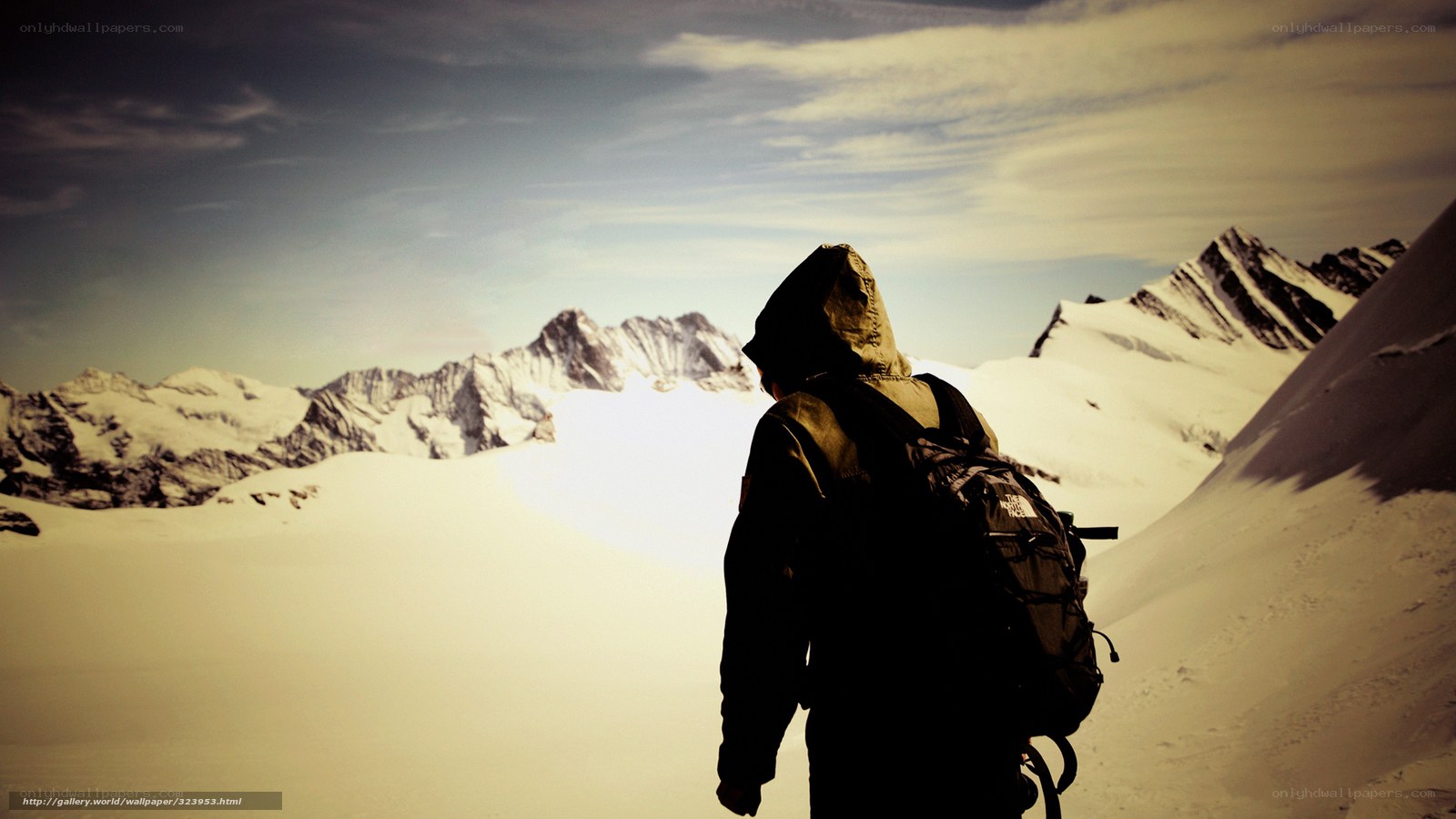 hiker in snowy mountains