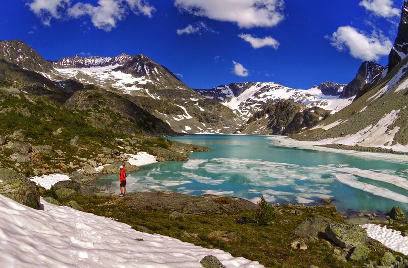 Hiker Near Alpine Lake
