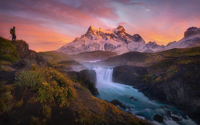 Hiker Near Waterfall — Pink