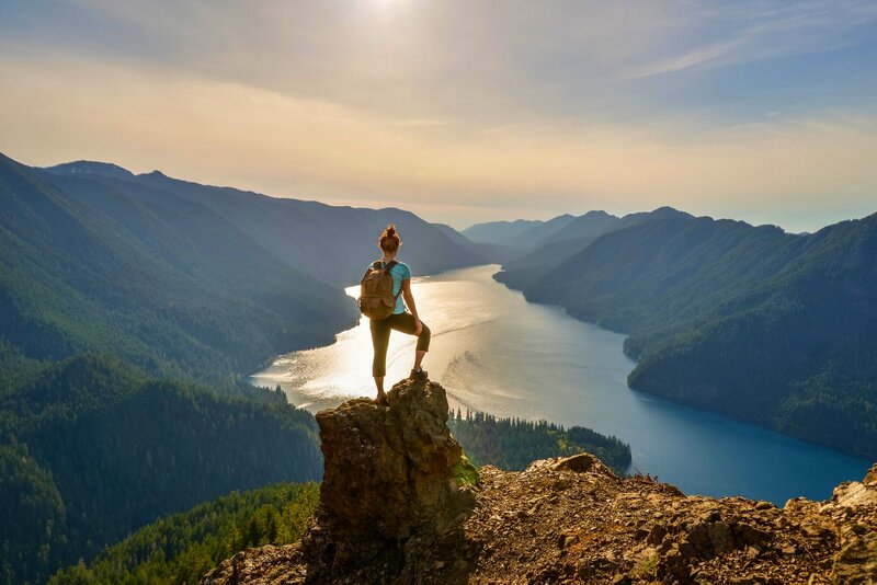 Hiker on a Cliff — Blue