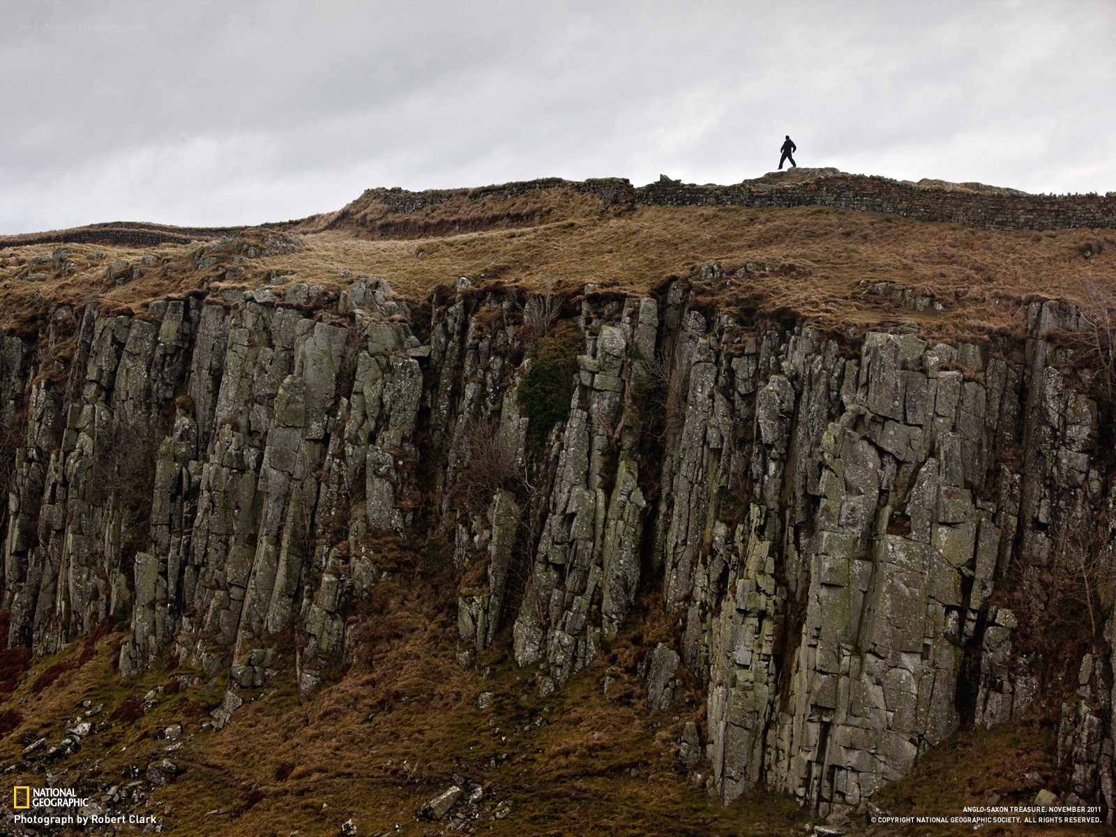 Hiker on a cliff edge