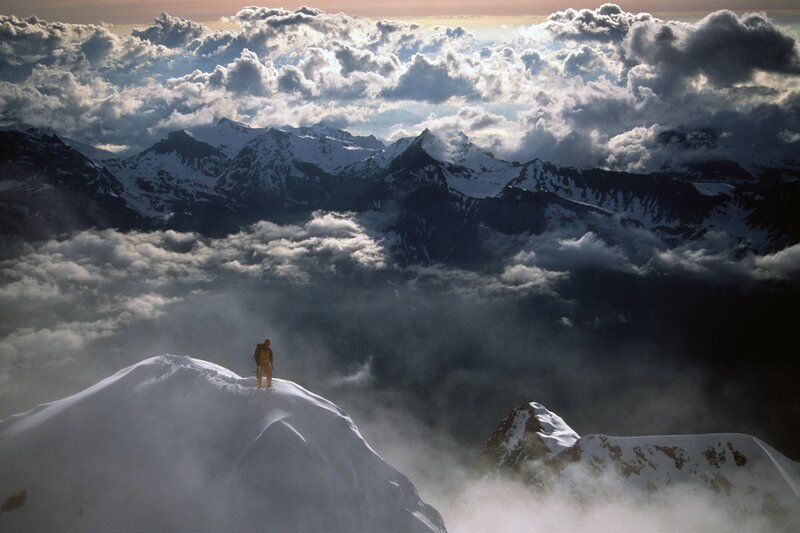 Hiker on a snowy peak