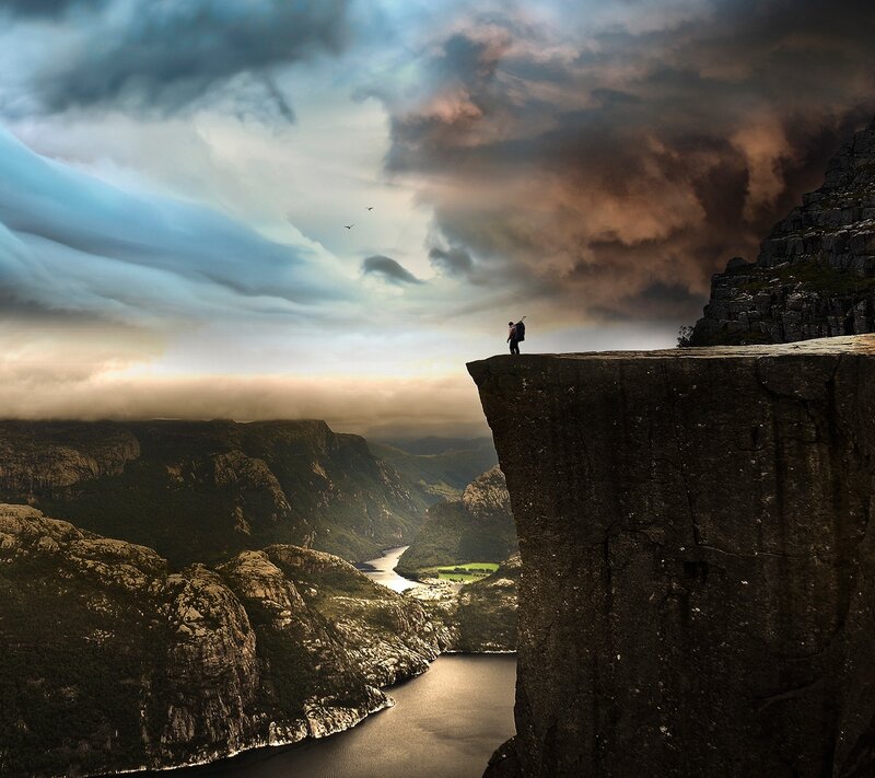 Hiker on Cliff Edge — Gray