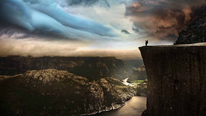 Hiker on Cliff Edge
