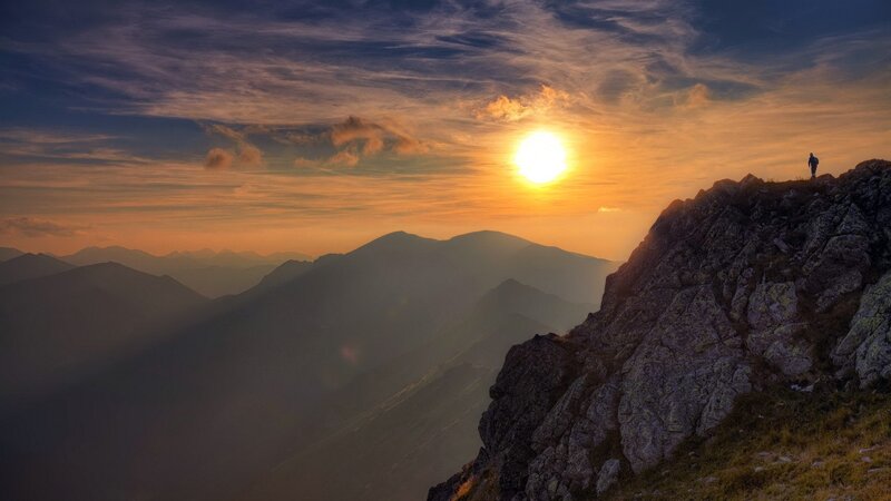 Hiker on Mountain Peak — Orange, Dramatic, Sunset