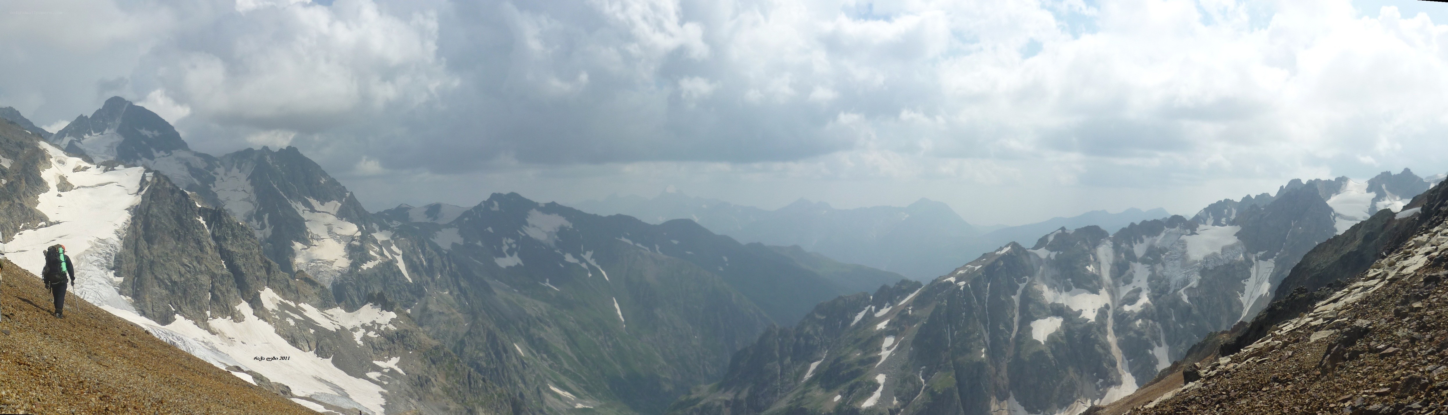 hiker on mountain ridge