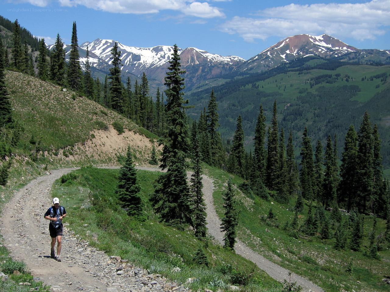 Hiker on mountain trail