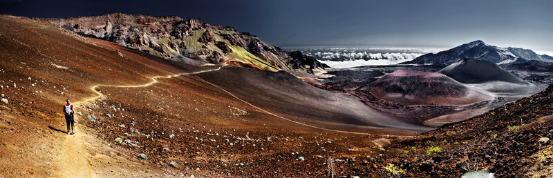 Hiker on volcanic trail