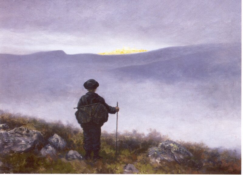Hiker overlooking a distant city