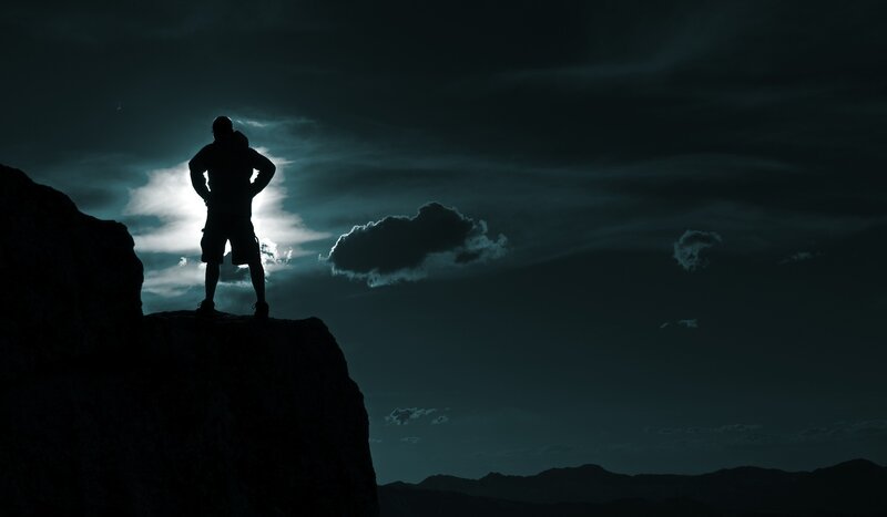 Hiker silhouetted at dusk