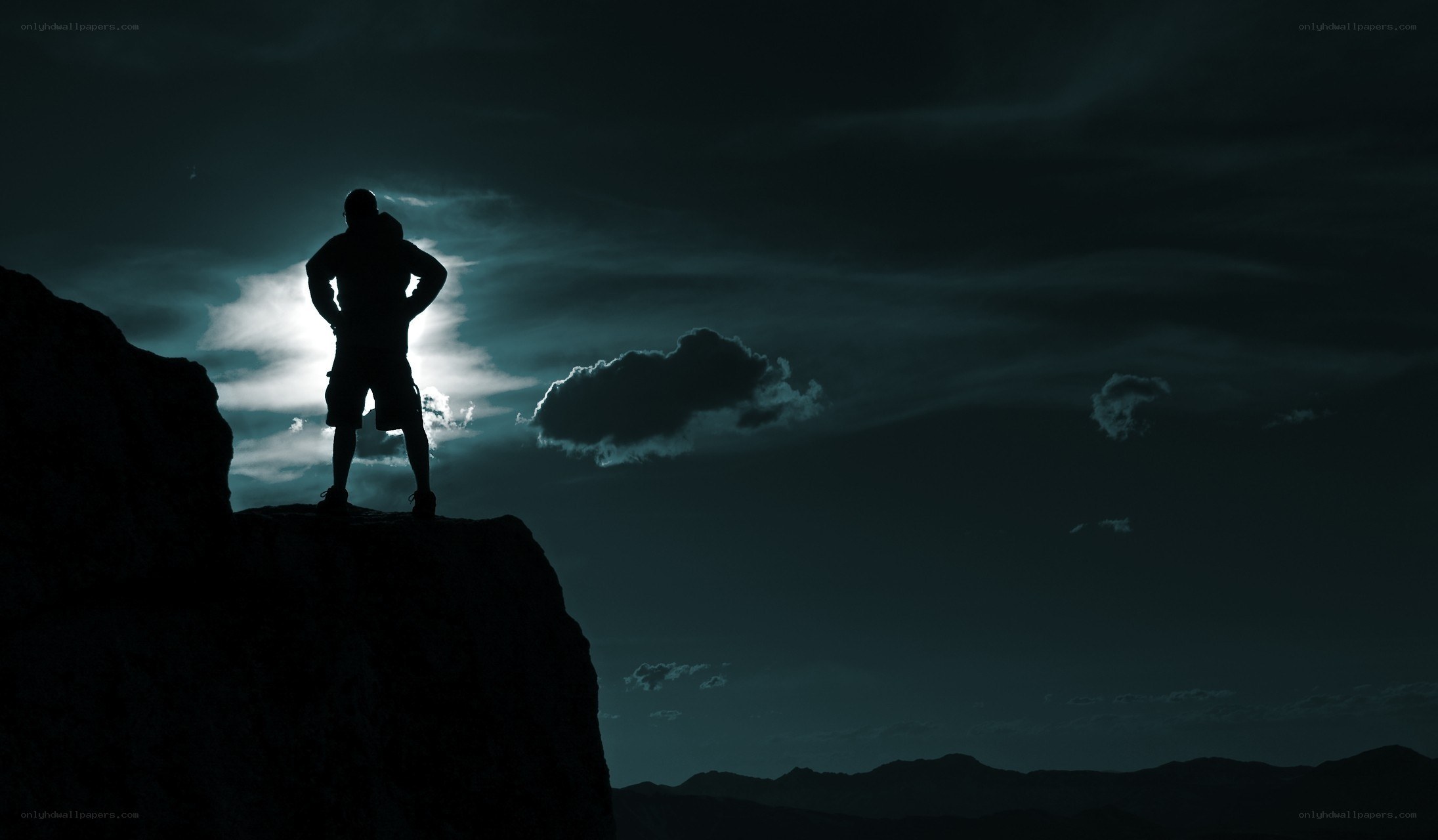 Hiker silhouetted at dusk