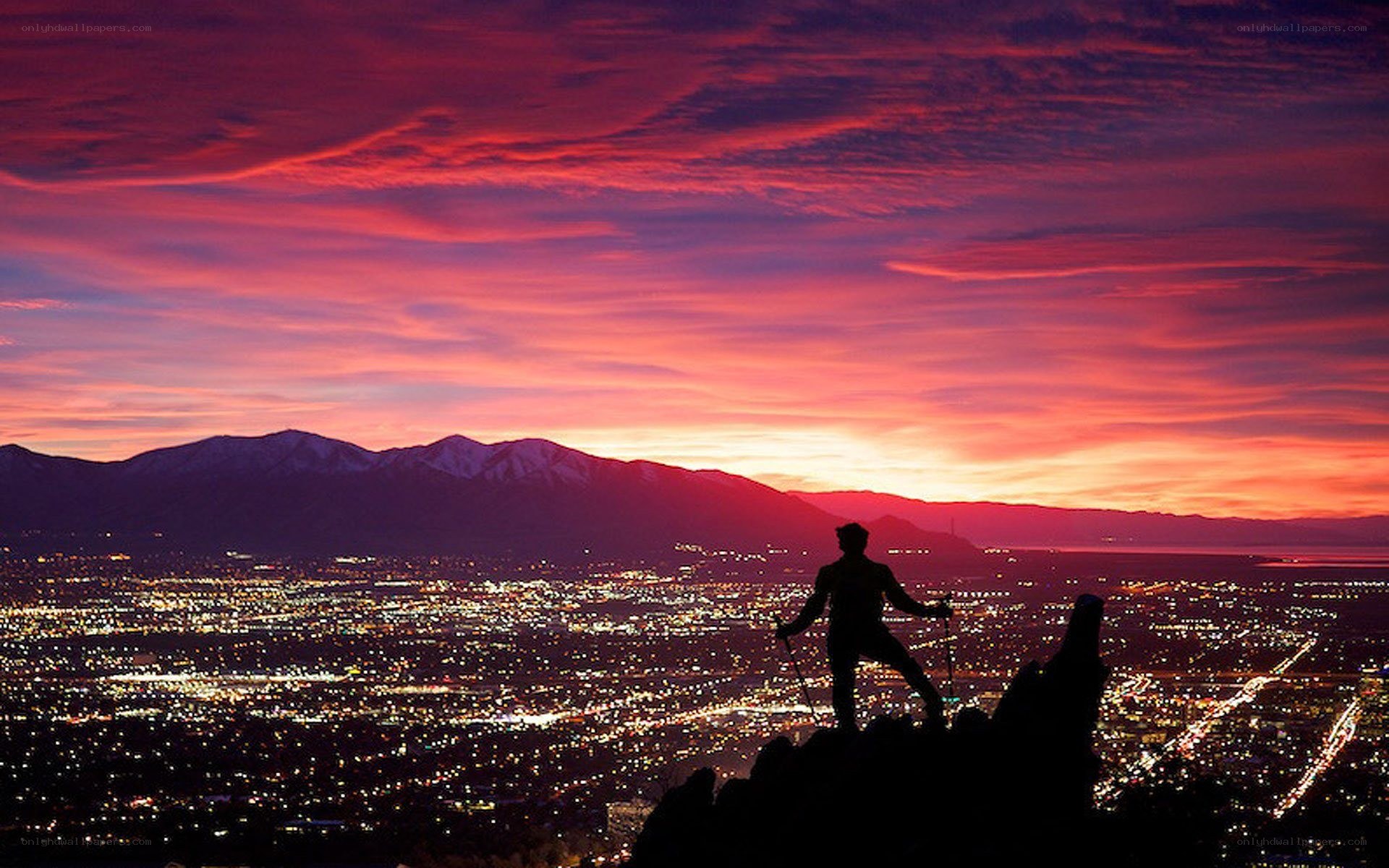 Hiker silhouetted at sunset