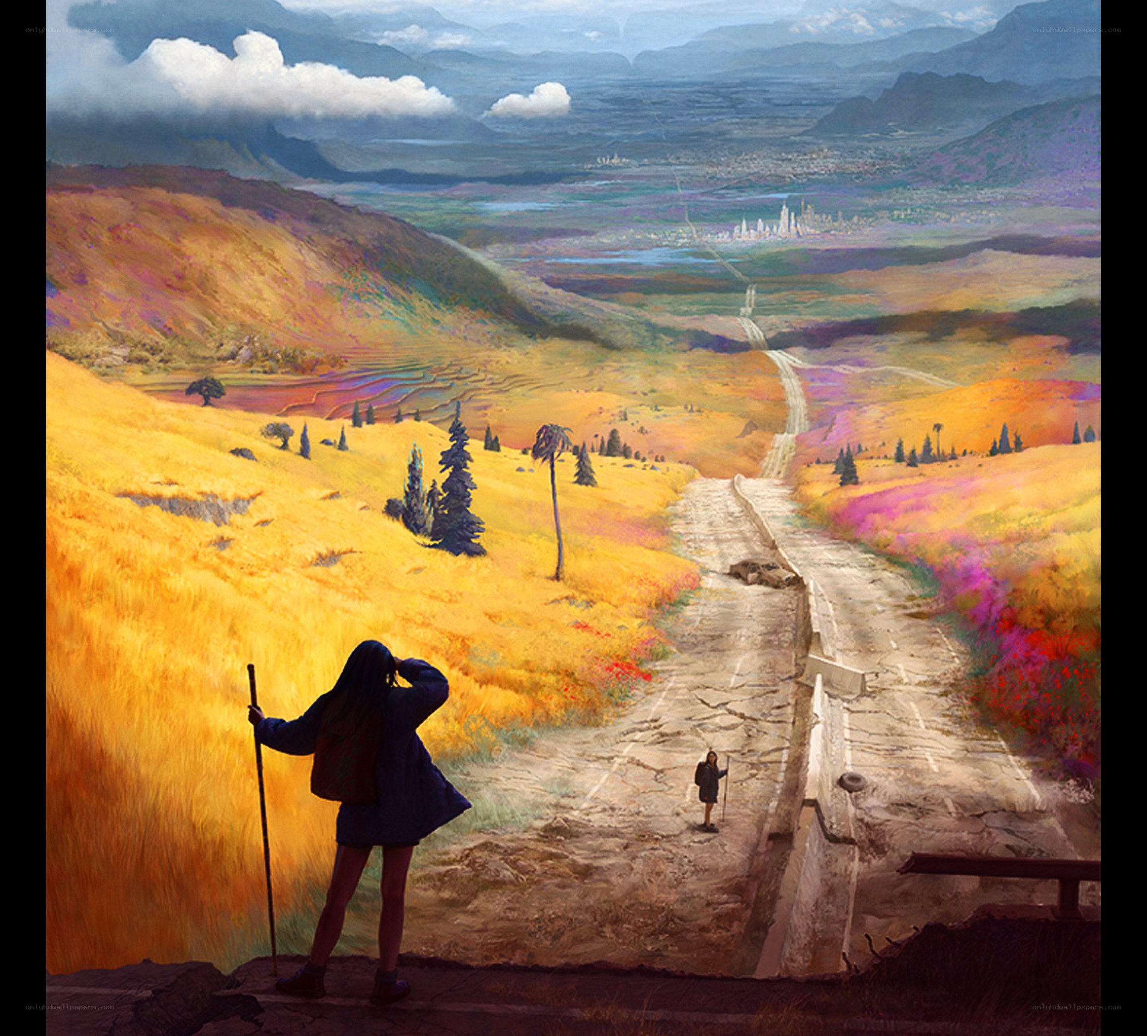 Hiker views distant city