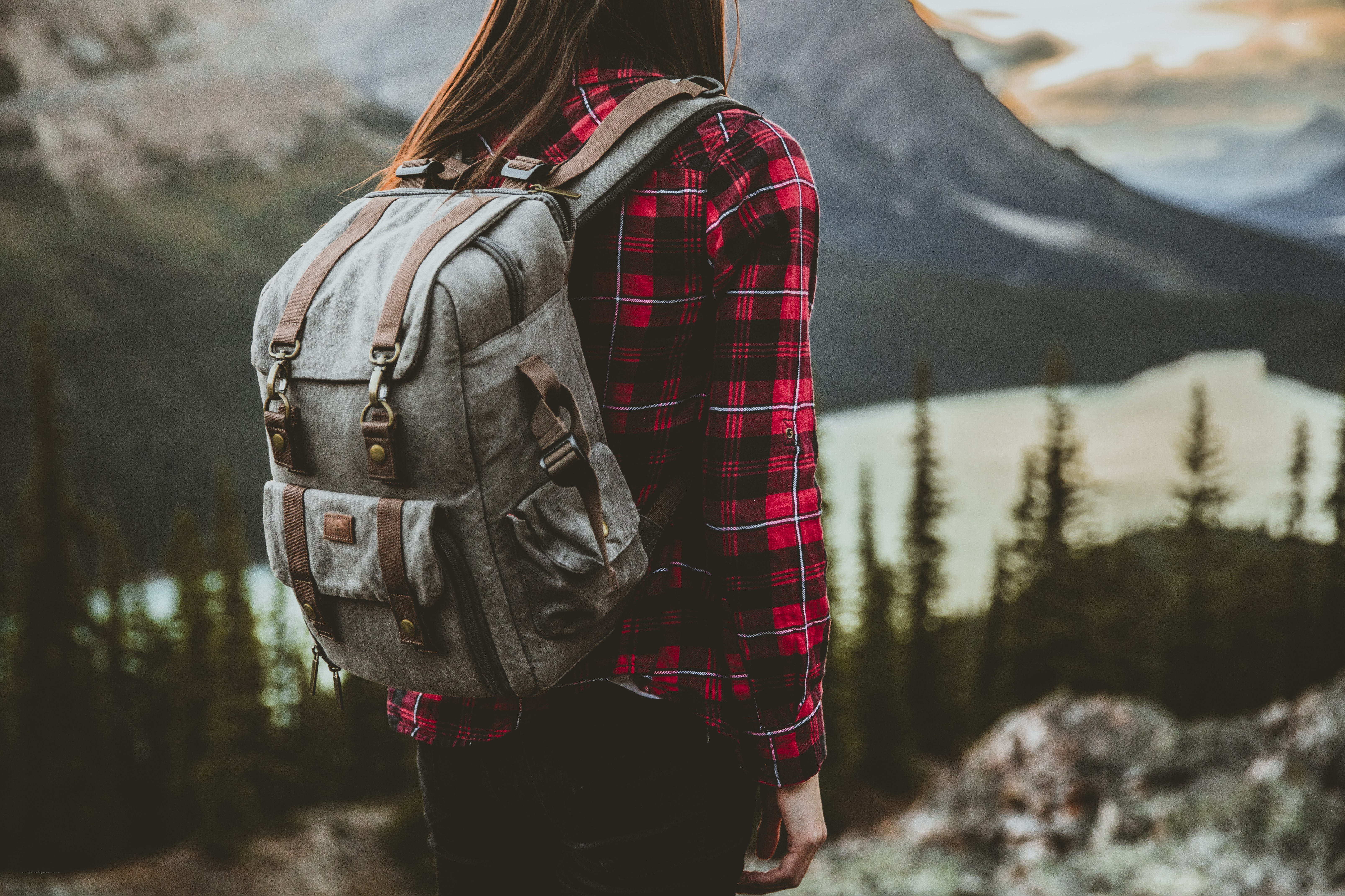 hiker with backpack in mountains