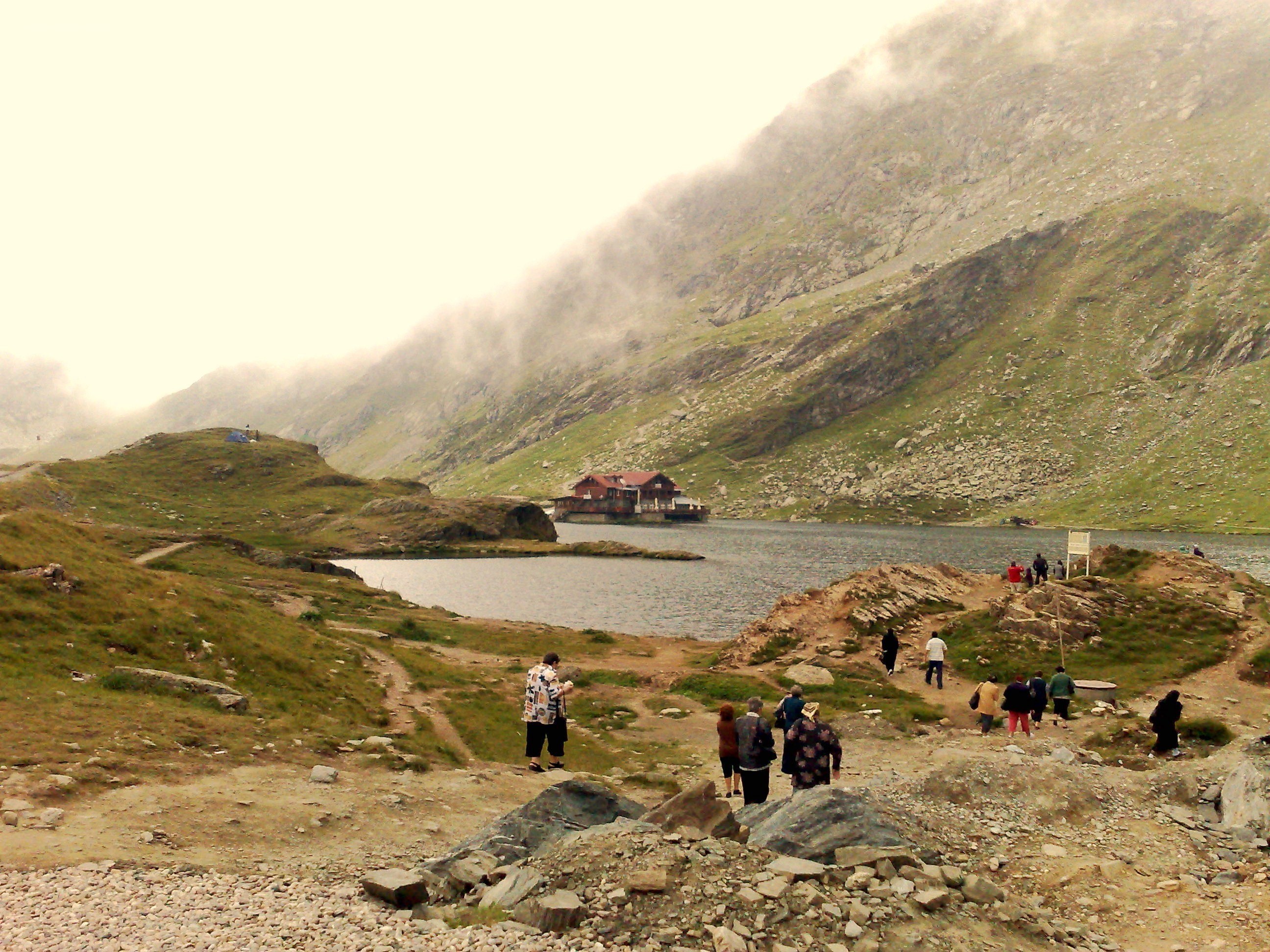 Hikers at a mountain lake