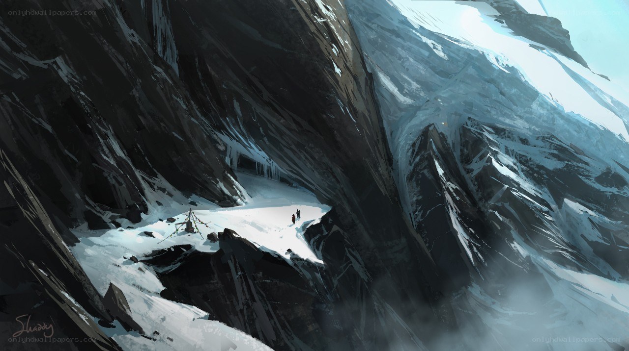 Hikers in a snowy mountain pass
