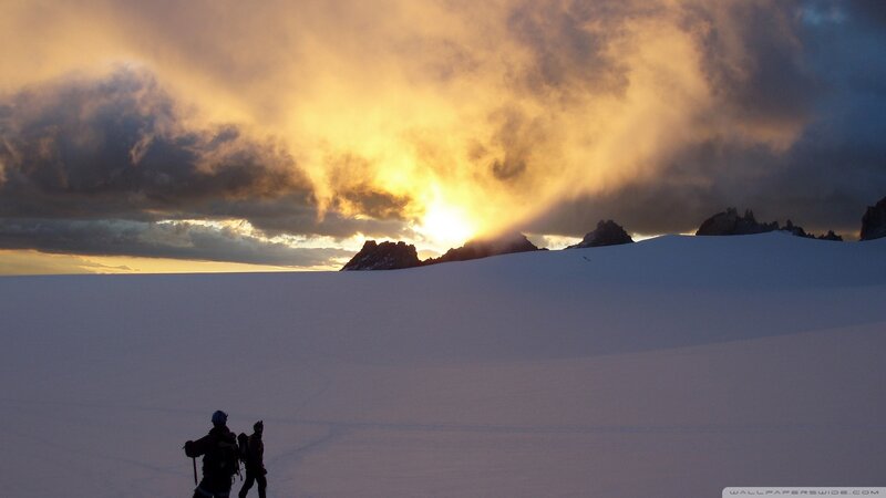 Hikers in Snowy Landscape