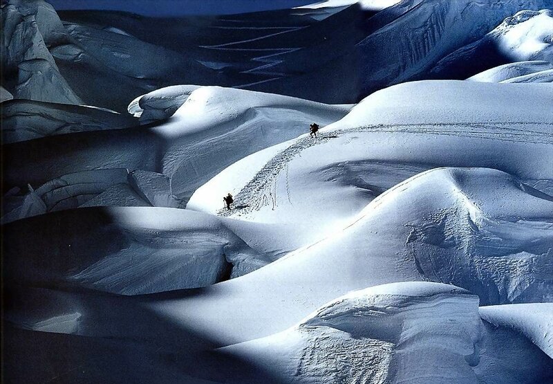 Hikers in Snowy Mountains