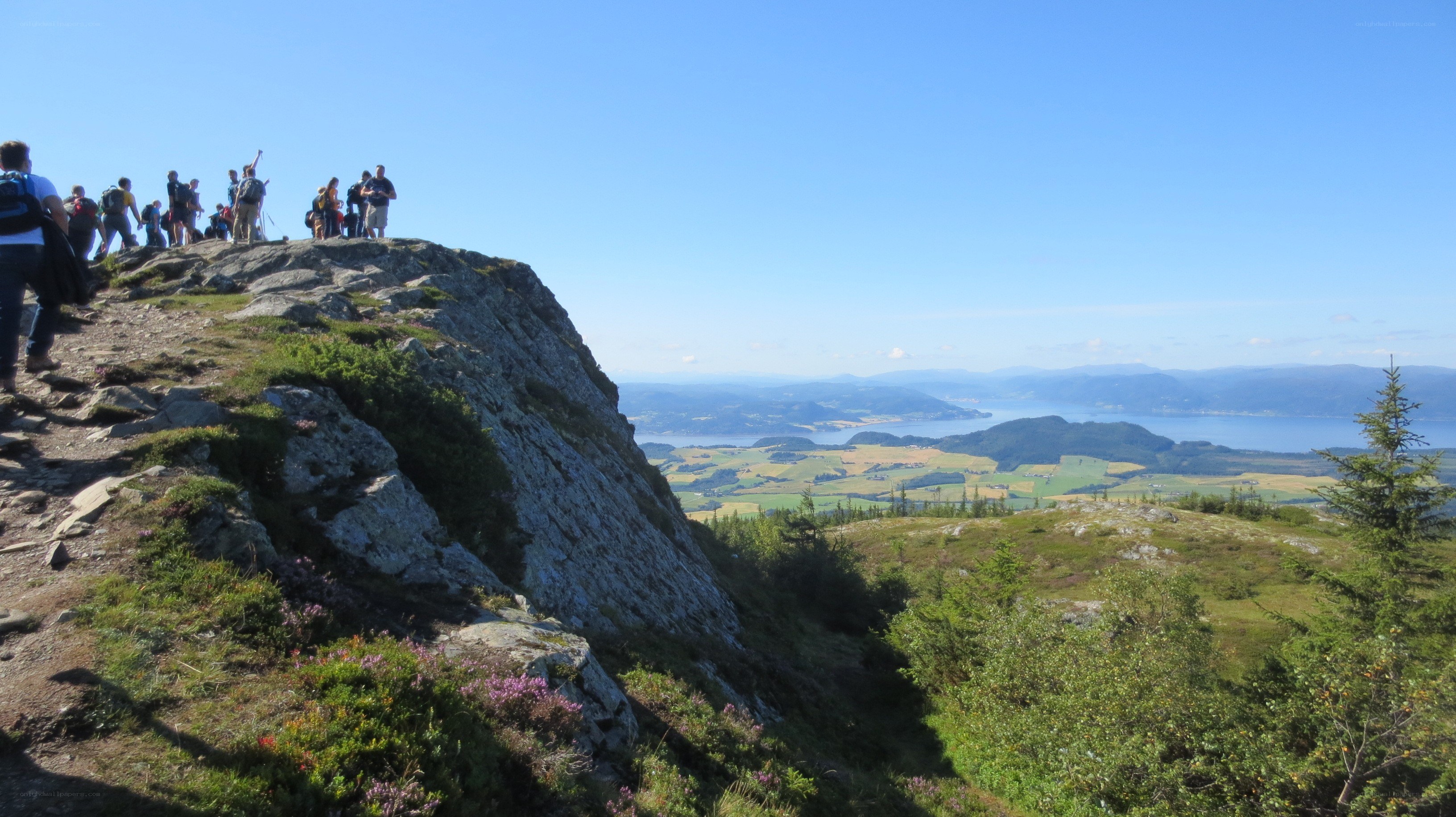 Hikers on a mountain peak