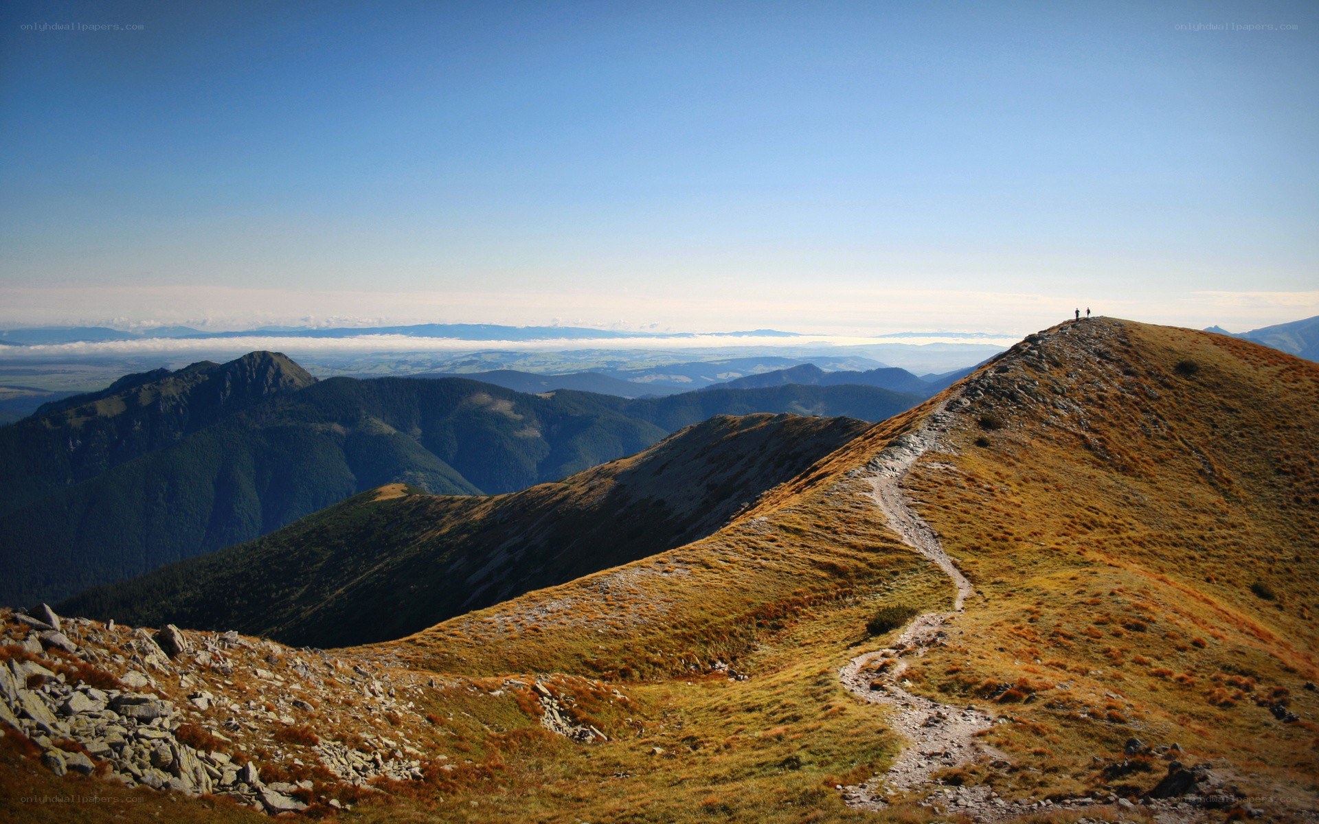 Hikers on a mountain ridge