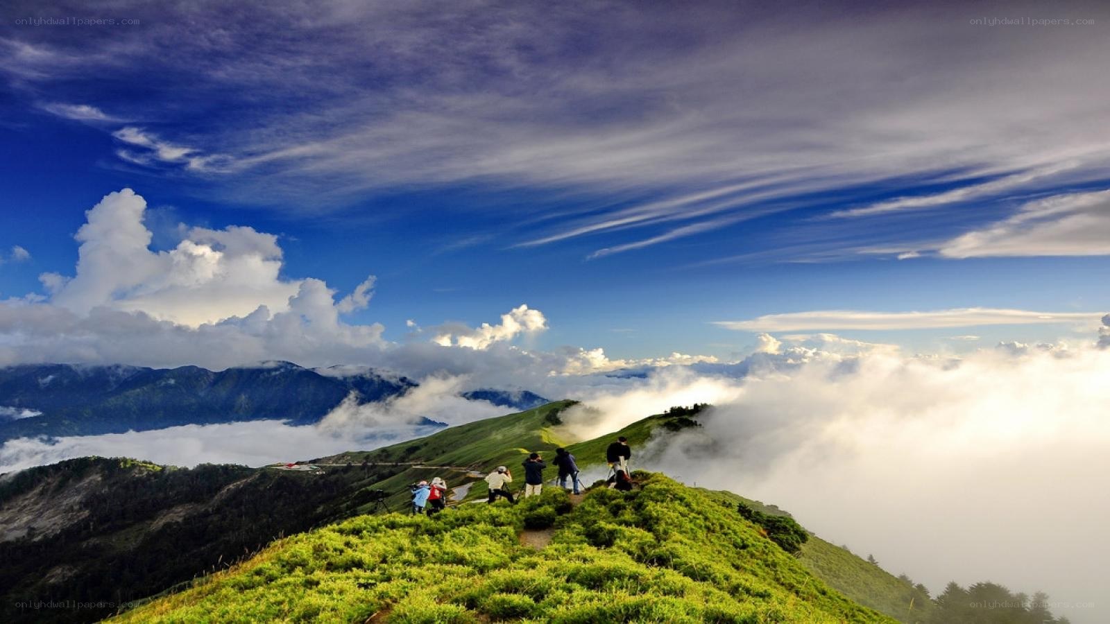 Hikers on a mountain ridge