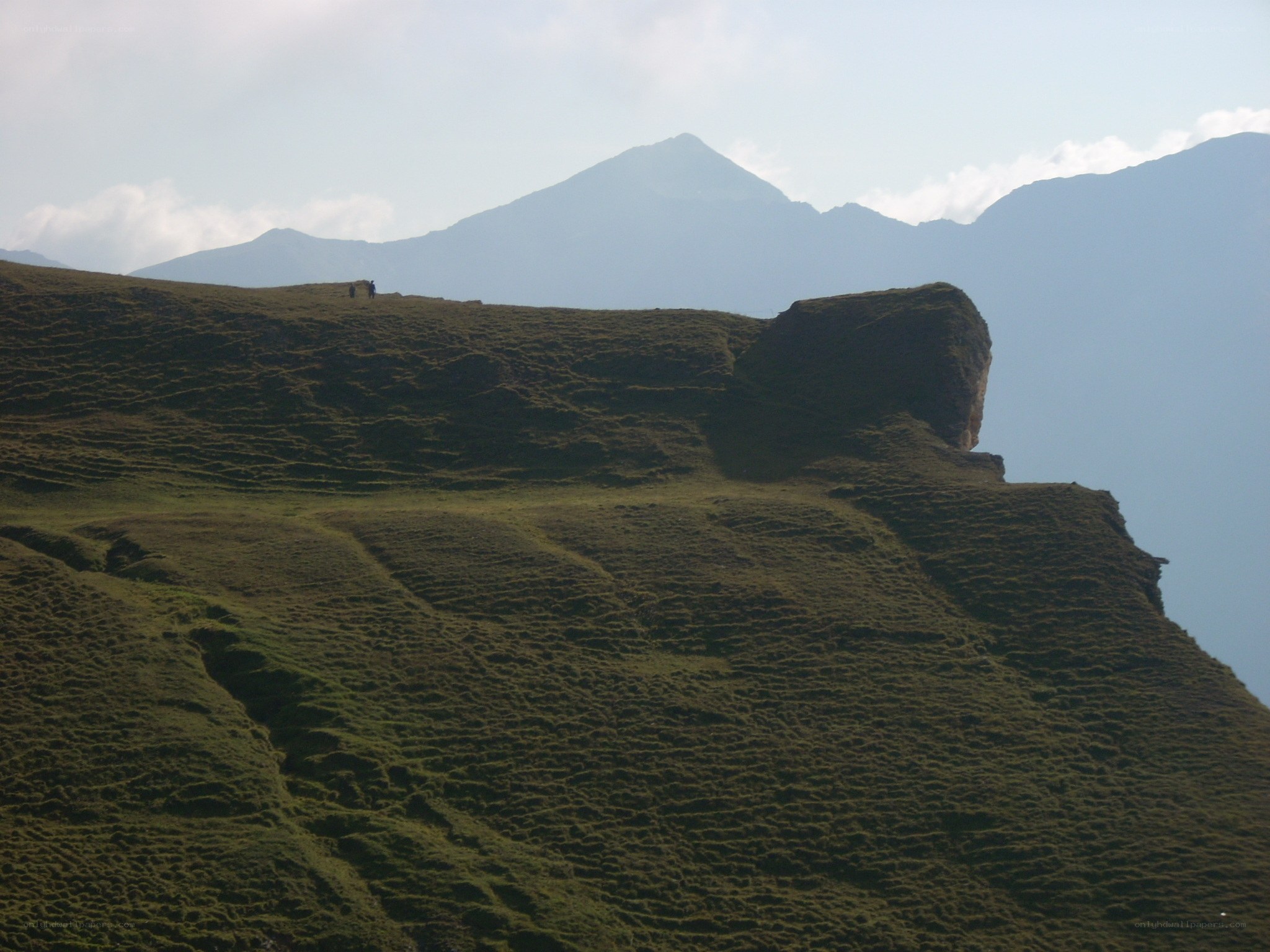 Hikers on a mountain ridge