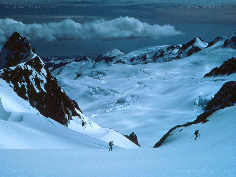 Hikers on a snowy mountain