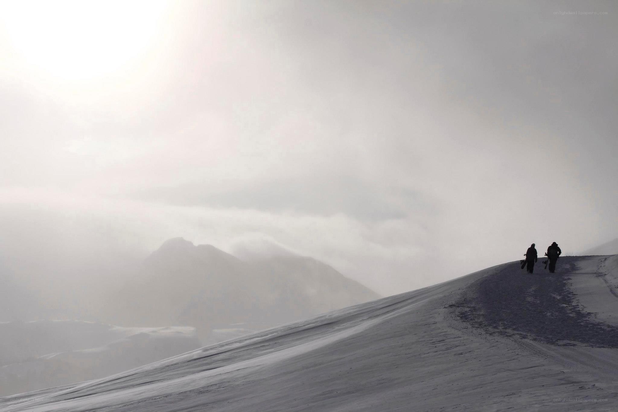 Hikers on a snowy mountain