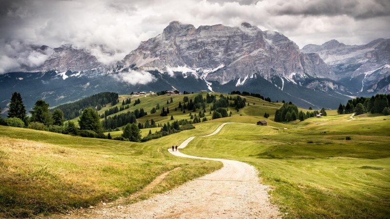 Hikers on Mountain Path — Green, Dramatic
