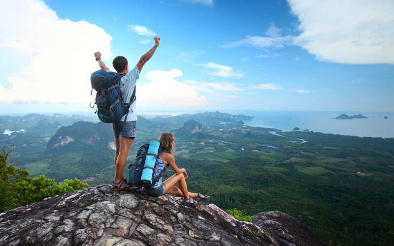 Hikers on Mountain Peak — Blue, Serene
