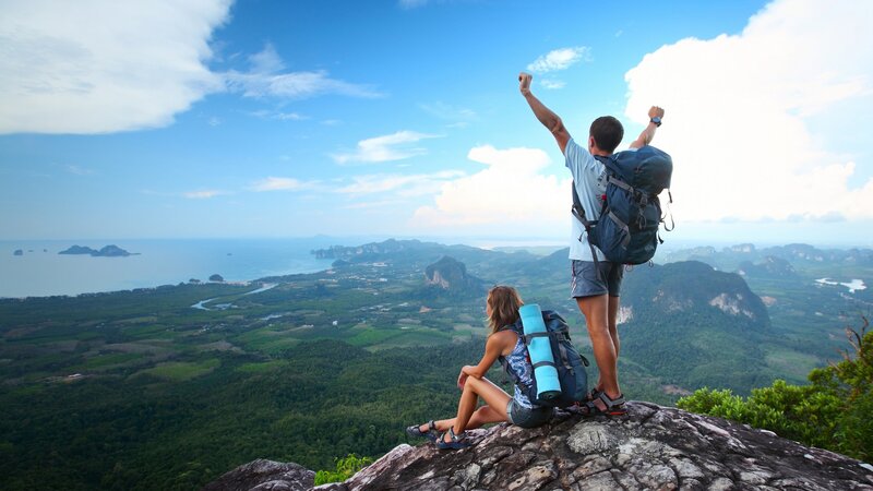 Hikers on Mountain Peak — Blue