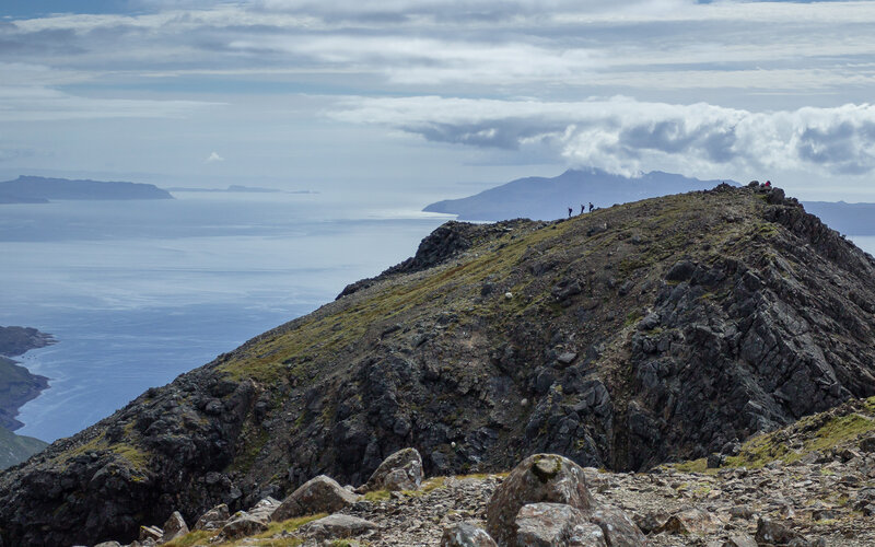 Hikers on Mountain Ridge — Gray, Dramatic