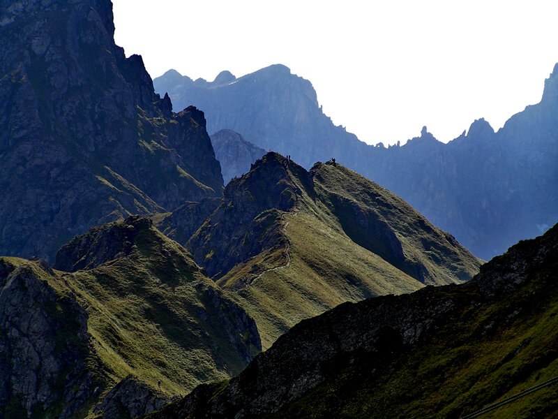 Hikers on Mountain Ridge — Green, Dramatic, Afternoon