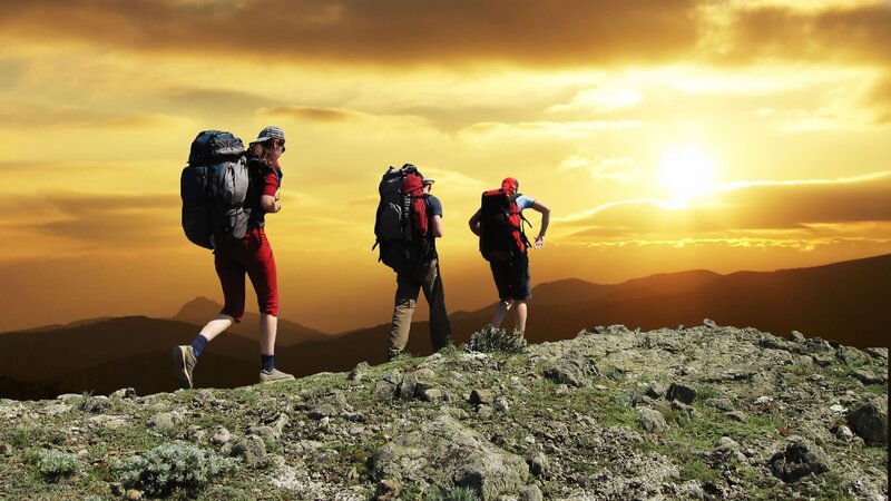 Hikers on Mountain Ridge — Orange